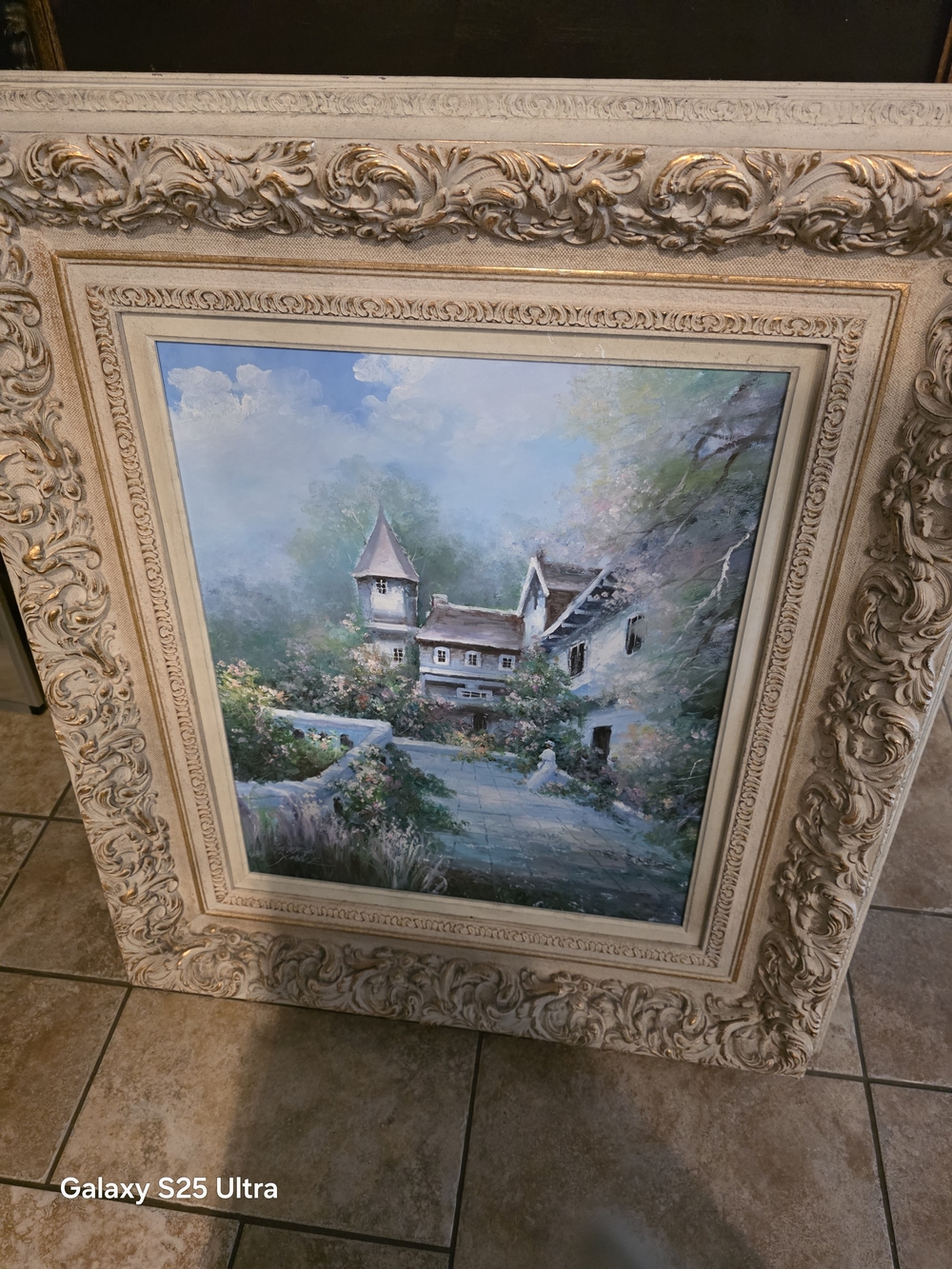 Unbranded Cream Framed Cottage Landscape Painting with Soft Blue & Green Tones